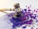 Solana News: South Korea Sets DeFi Precedent with First DEX Rug Pull Criminal Case 3D gavel striking digital blockchain surface with purple and magenta fragments representing DeFi regulation